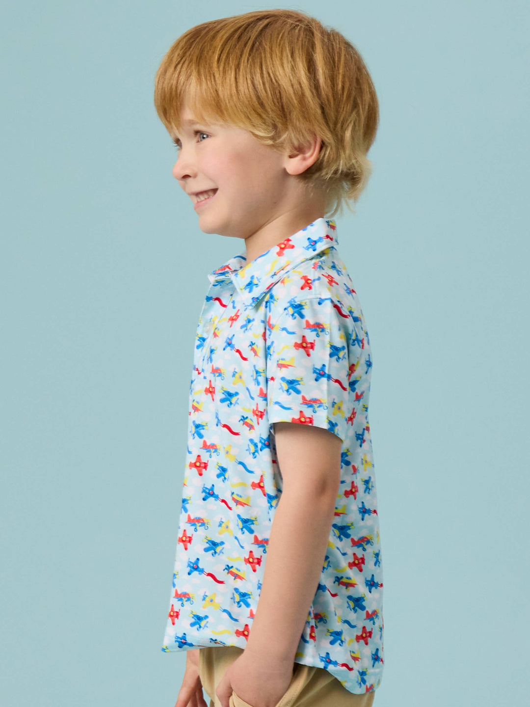 RuffleButts  Boys Tiny Plane Parade Knit Short Sleeve Performance Polo