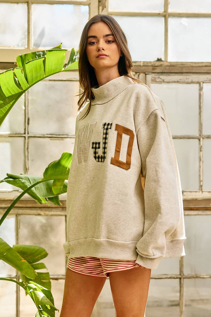 BUCKETLIST INC - IT2594E-WWJD1 | WWJD Embroidered Mock-neck Sweatshirt