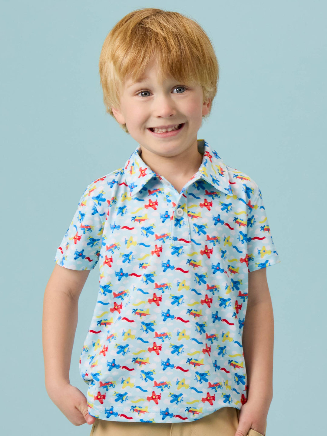 RuffleButts  Boys Tiny Plane Parade Knit Short Sleeve Performance Polo