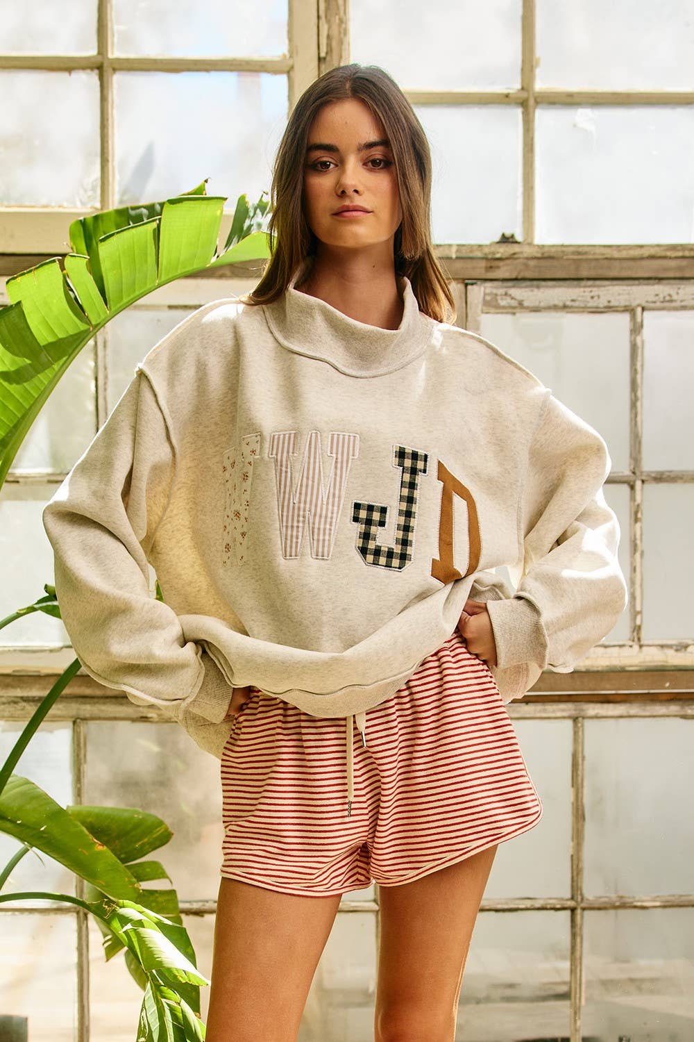 BUCKETLIST INC - IT2594E-WWJD1 | WWJD Embroidered Mock-neck Sweatshirt