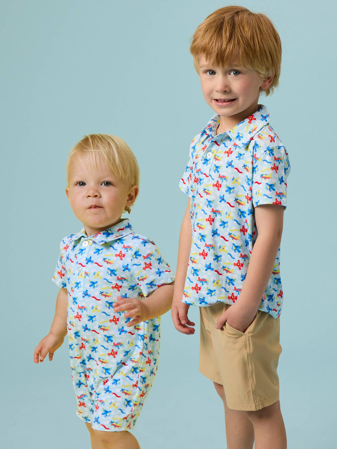 RuffleButts  Boys Tiny Plane Parade Knit Short Sleeve Performance Polo