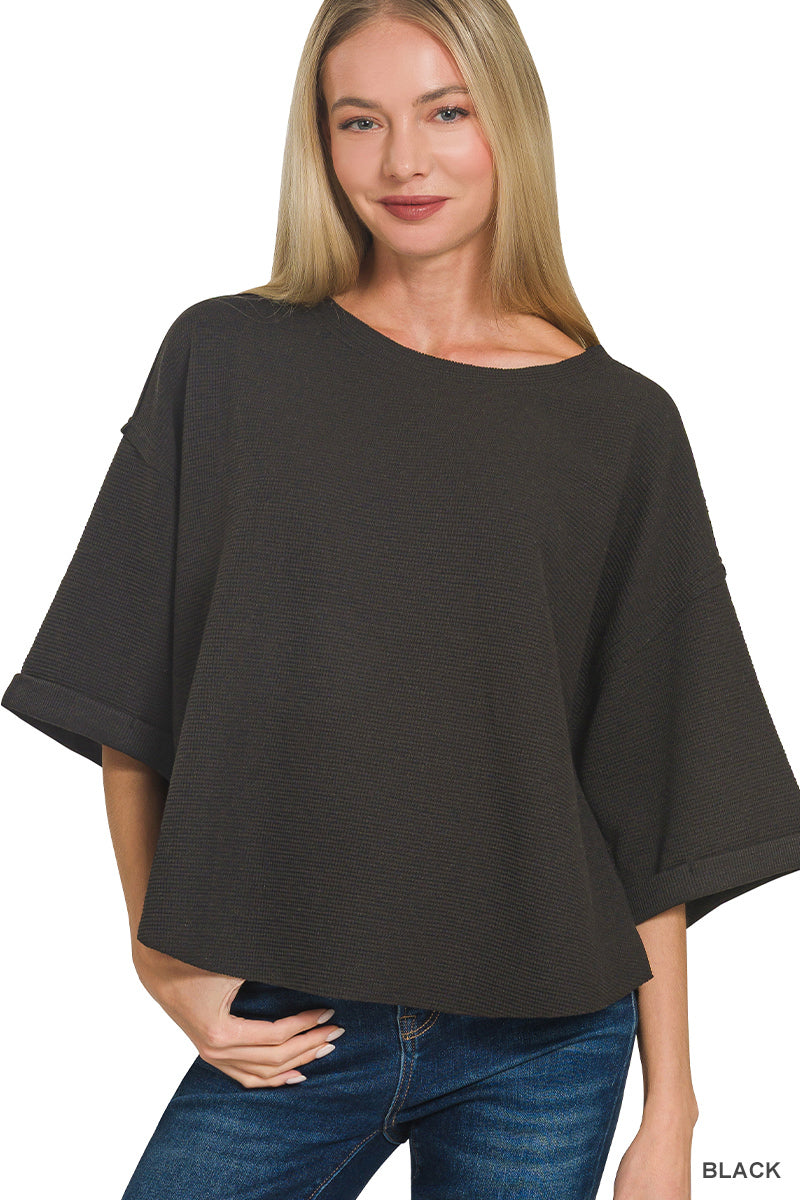 Double knit exposed seam curved hem short sleeve top