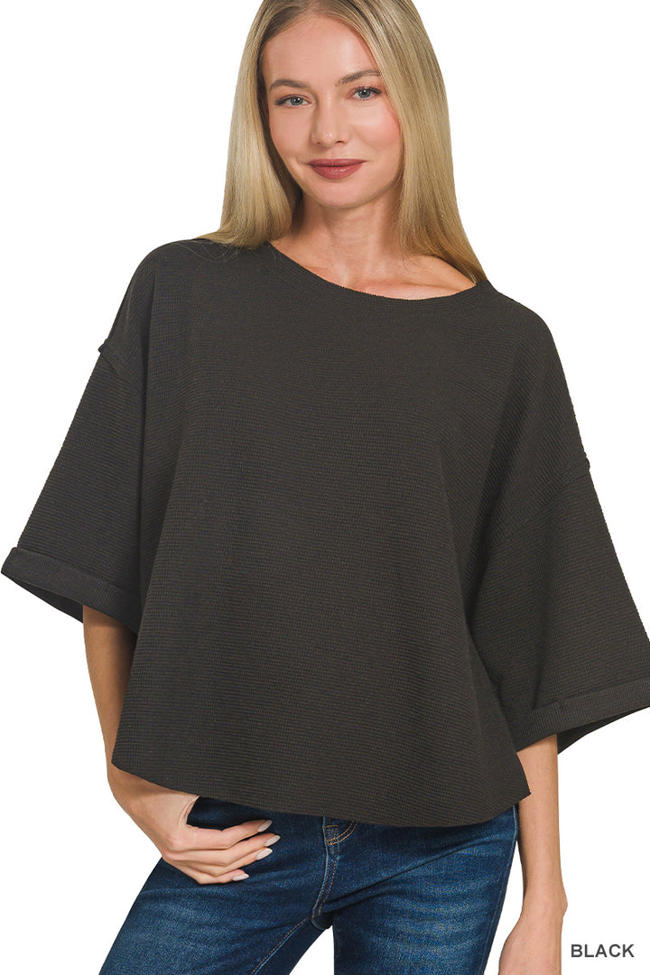 Double knit exposed seam curved hem short sleeve top