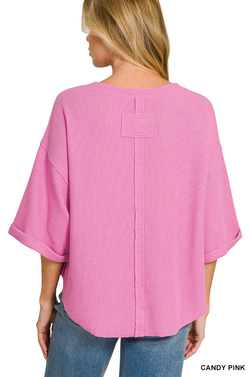 Double knit exposed seam curved hem short sleeve top