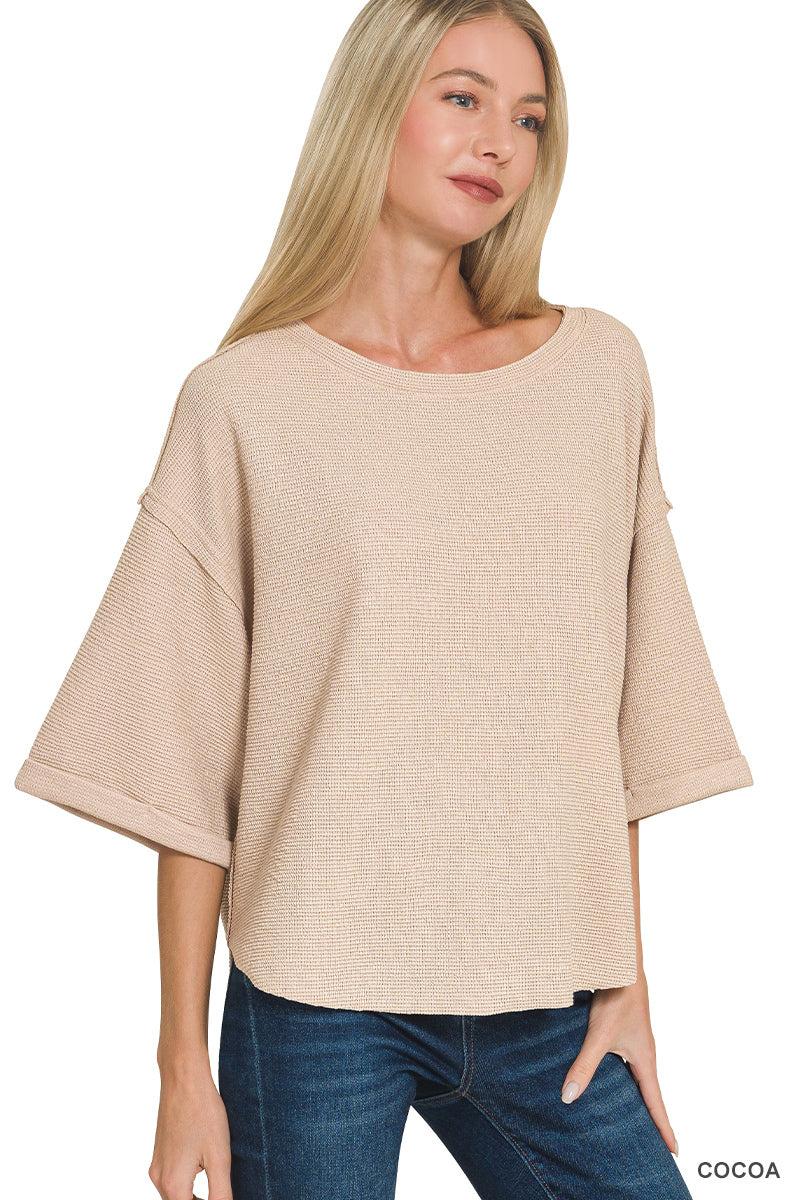 Double knit exposed seam curved hem short sleeve top