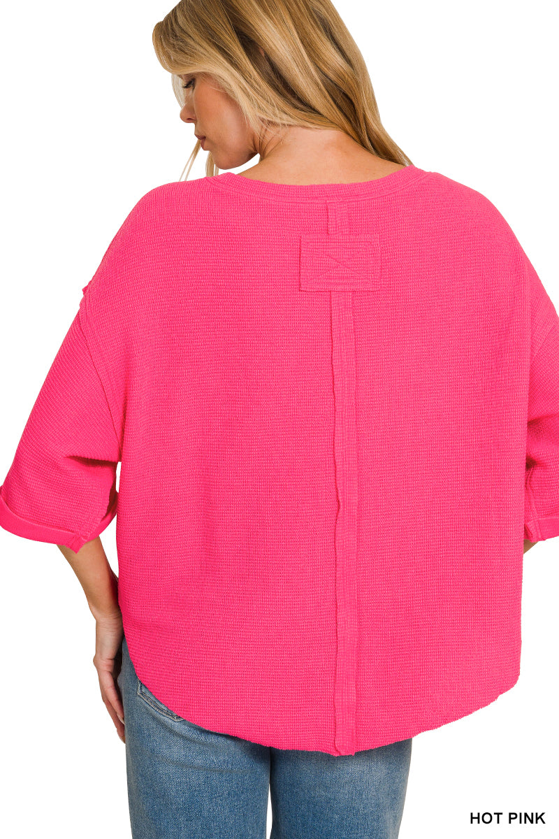 Double knit exposed seam curved hem short sleeve top