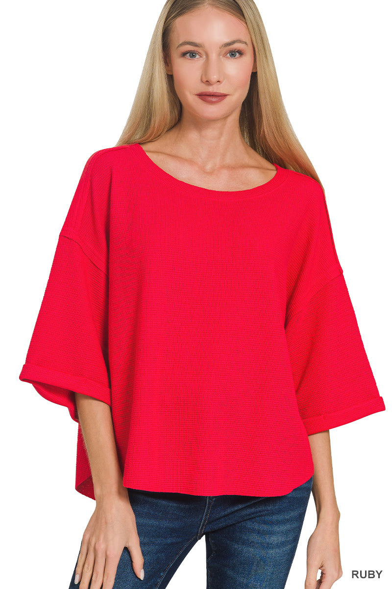 Double knit exposed seam curved hem short sleeve top