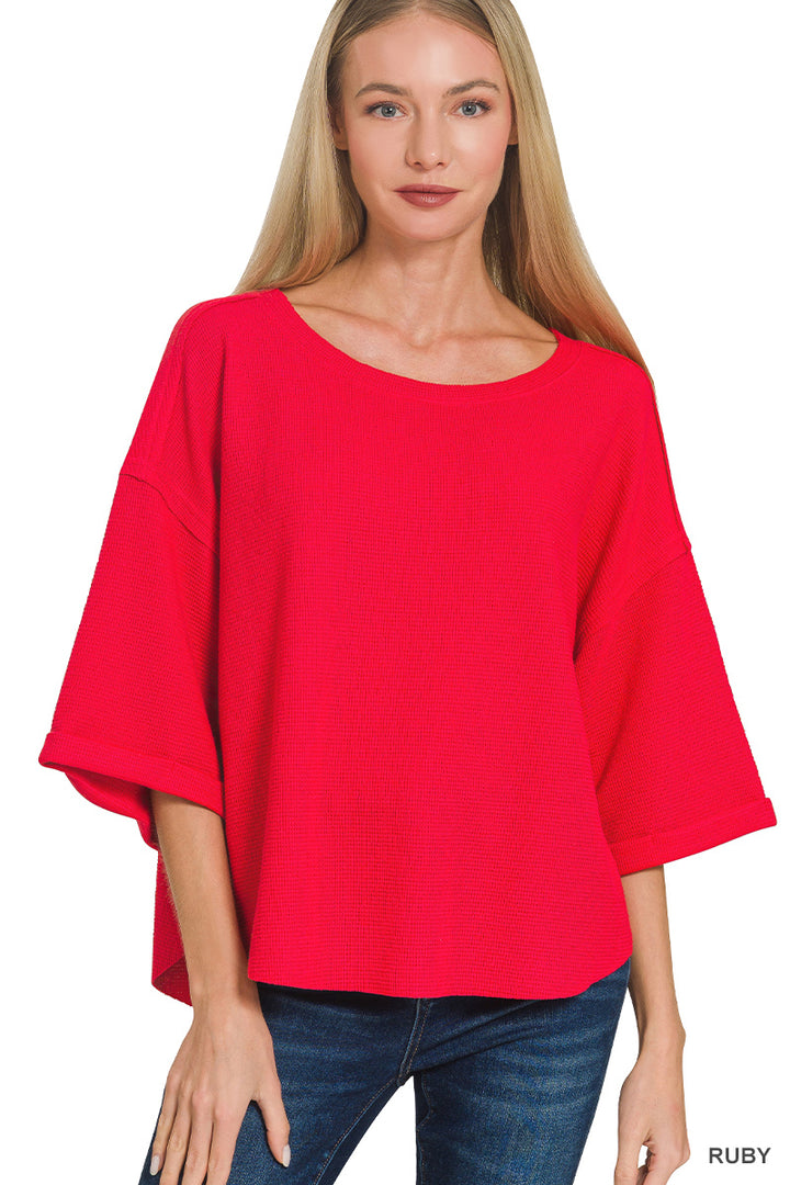 Double knit exposed seam curved hem short sleeve top