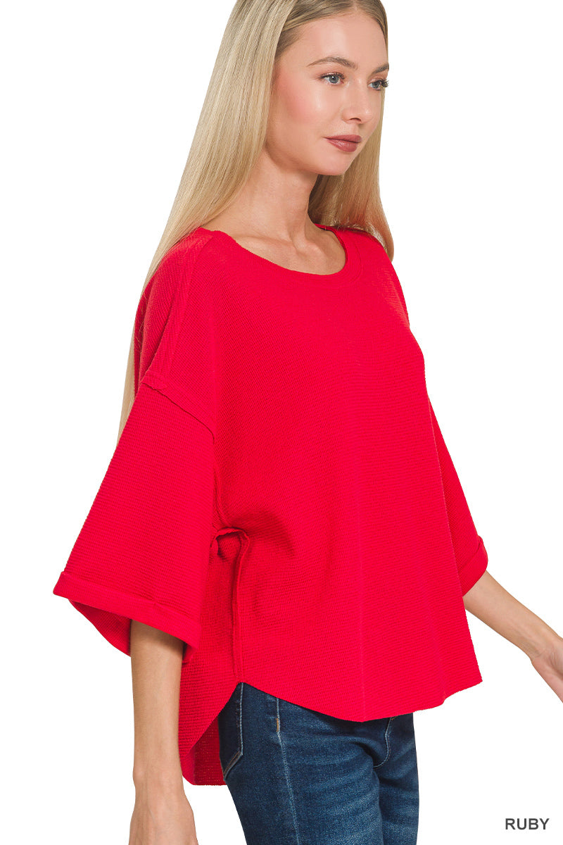 Double knit exposed seam curved hem short sleeve top