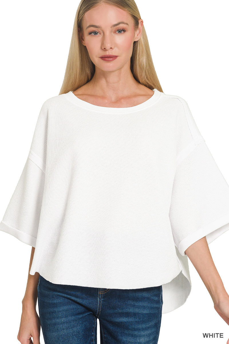 Double knit exposed seam curved hem short sleeve top