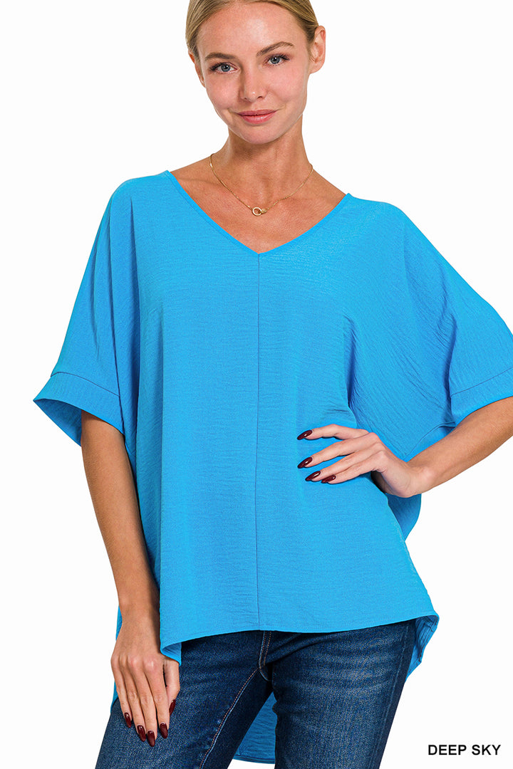 Woven airflow v-neck dolman short sleeve top