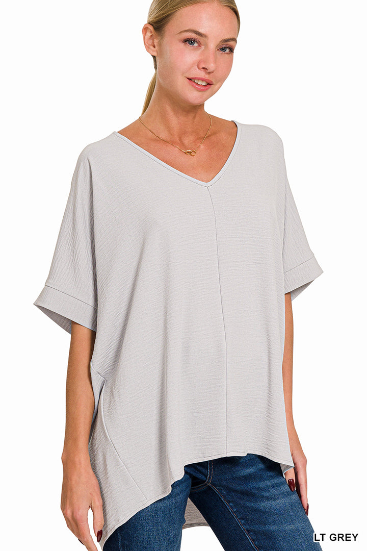 Woven airflow v-neck dolman short sleeve top