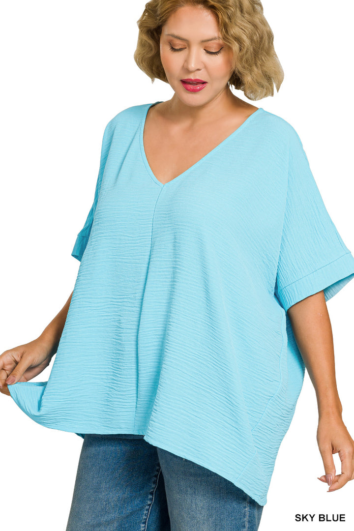 Plus Size woven airflow v-neck dolman short sleeve top