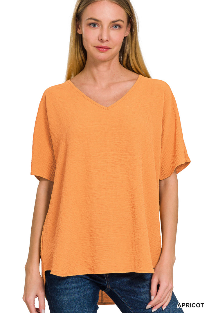 Woven airflow v-neck short sleeve top