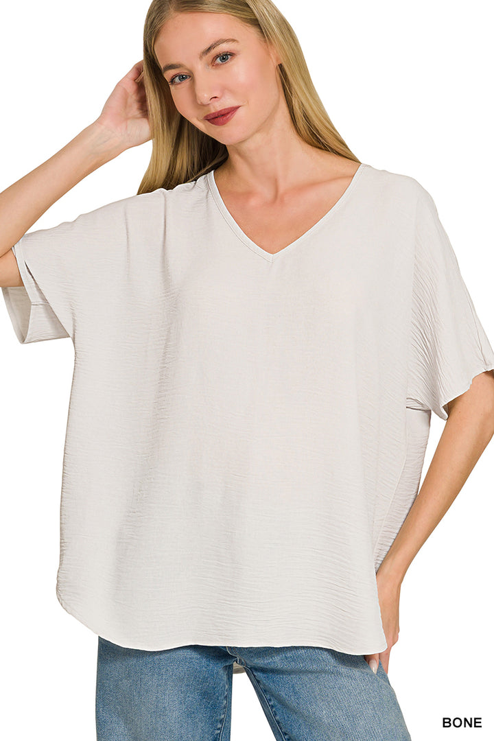 Woven airflow v-neck short sleeve top