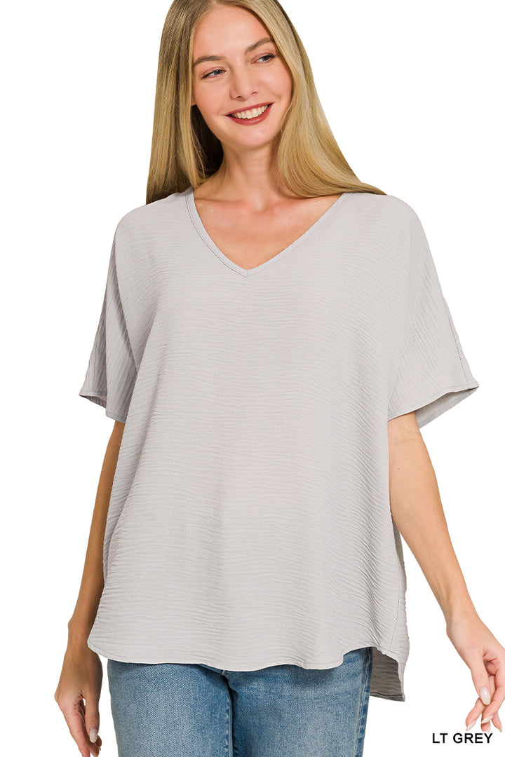 Woven airflow v-neck short sleeve top