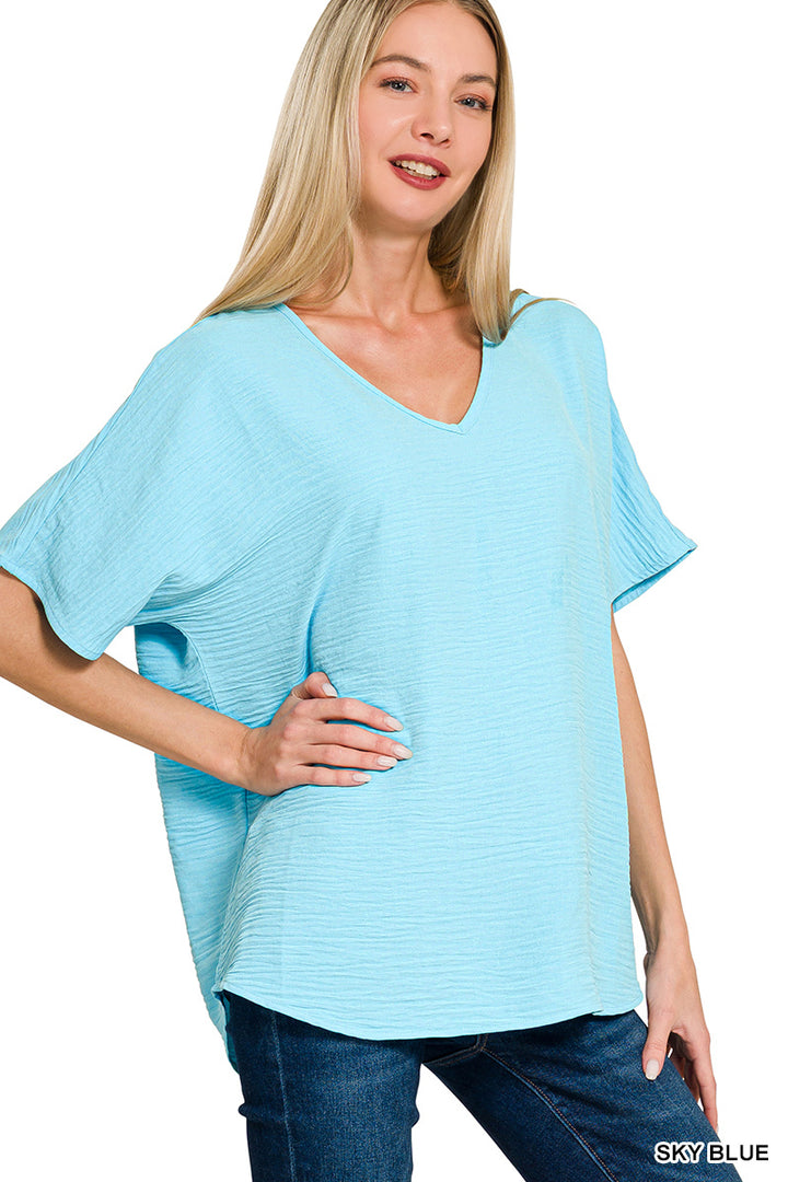 Woven airflow v-neck short sleeve top