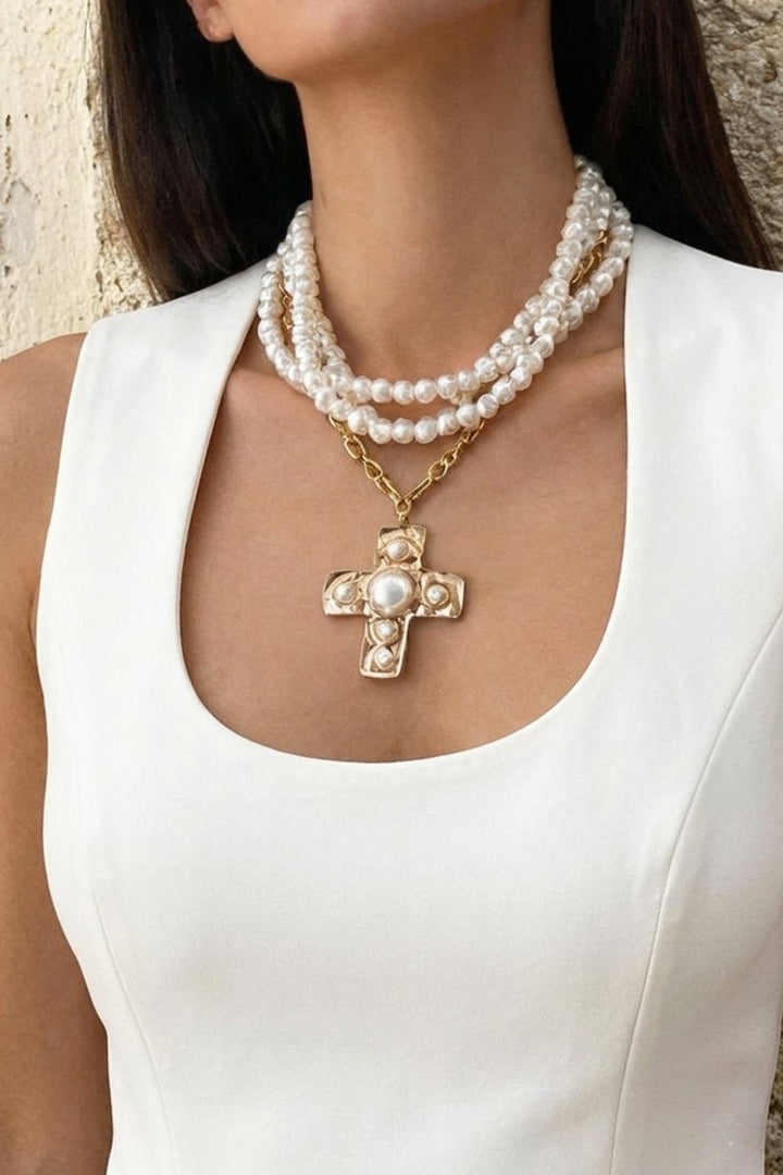 Notable hammered cross multi wrap pearl necklace