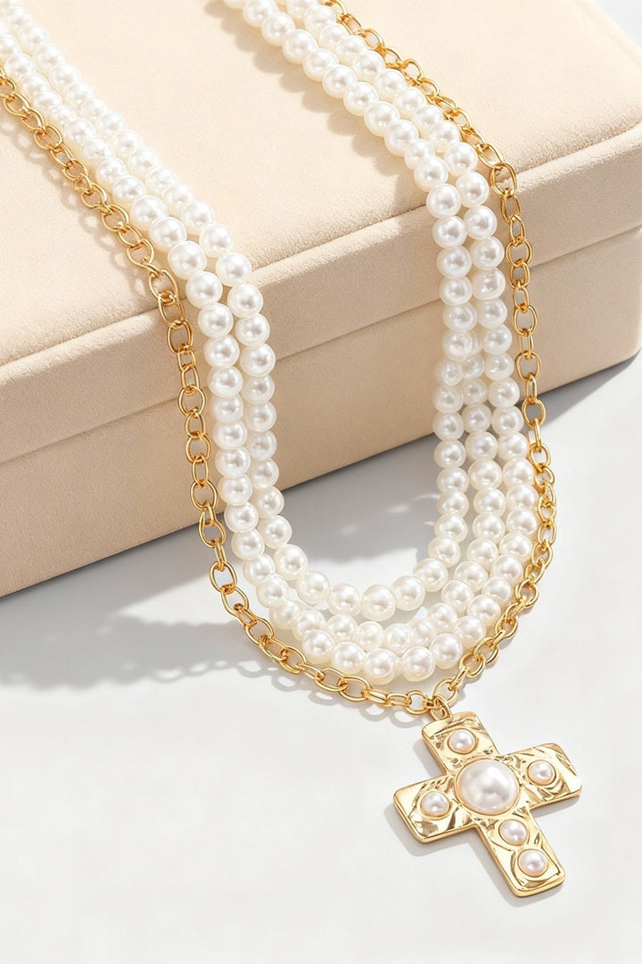 Notable hammered cross multi wrap pearl necklace