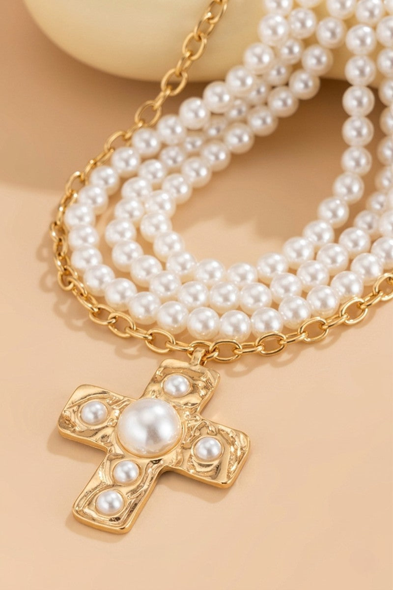 Notable hammered cross multi wrap pearl necklace