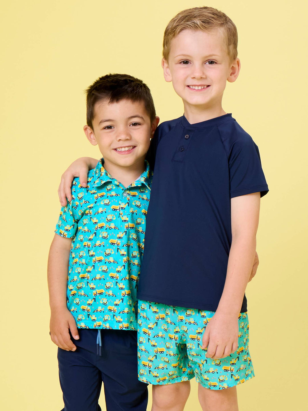 RuffleButts- Boys Under Construction Knit Short Sleeve Performance Polo